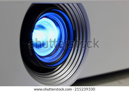 Blue projector close lens