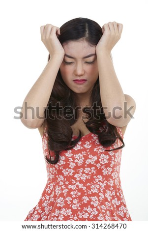 unhappy stressed angry young woman shooting in white background