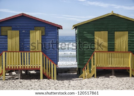 bright coloured beach huts