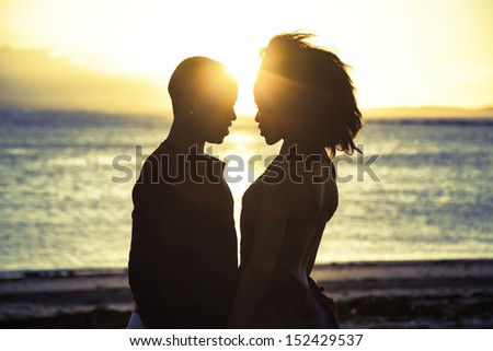 silhouette couple love at sunset