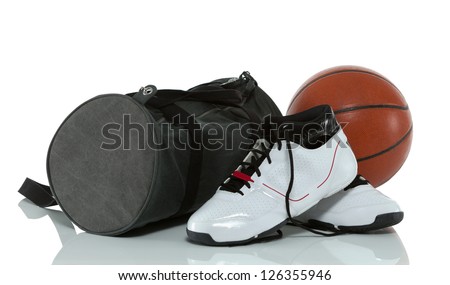 Basketball, shoes and gym bag isolated on white