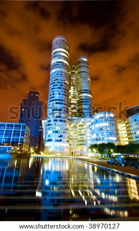 Modern paris architecture at night, wide angle perspective