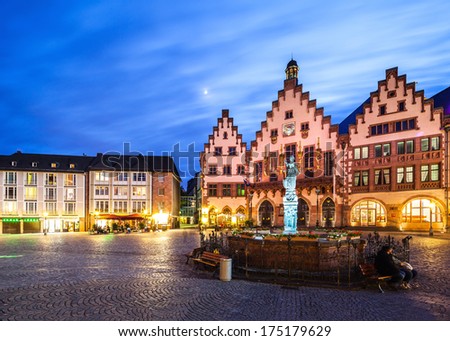 Frankfurt city hall and statue of justice after sunset
