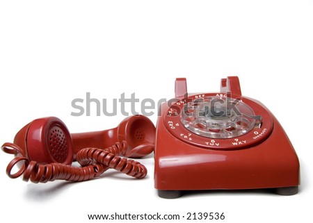 old antique style rotary telephone isolated on white