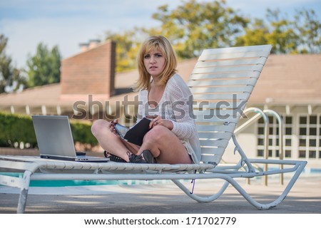 Attractive blond caucasian woman lounging