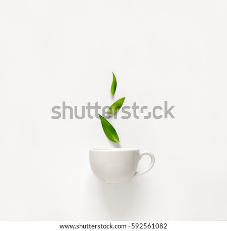 Similar – Image, Stock Photo White tea cup and saucer with a pattern for drink on white background. Ceramic coffee cup or mug close up. Mockup classic porcelain utensils. copy space