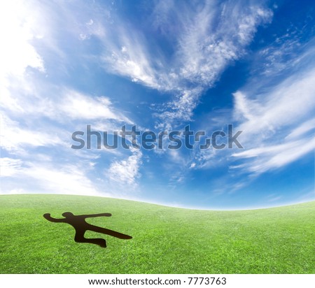 Concept of a lifeless person making a hole in the ground. Skydiver smashing into the ground.