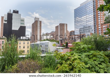 NEW YORK CITY - JULY 29,2014: View on Manhattan New York from High Line Park. The High Line is a public park built on an old railway track elevated above the streets of Manhattan.