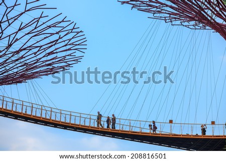 SINGAPORE - MARCH 27: Sky Walk of Supertree Grove at Gardens by the Bay on  MARCH 27, 2014 in Singapore.
