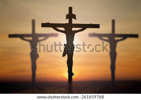 Jesus on cross with blur beautiful background.
