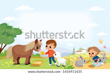 Kids feed the animals in the farm. Boy feeding a pony. Pets care. Girl feeding rabbits. Summer background with farm building.