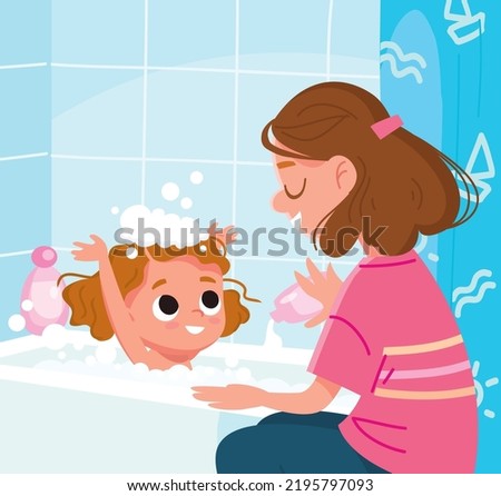 Mother washes her baby in bathroom. Baby girl taking bubble bath with foam all over the body and on the head. Mom bathing kid, child in large tub. Kids hygiene.