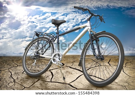 Sports bike in the desert against the background of the Sunny sky.