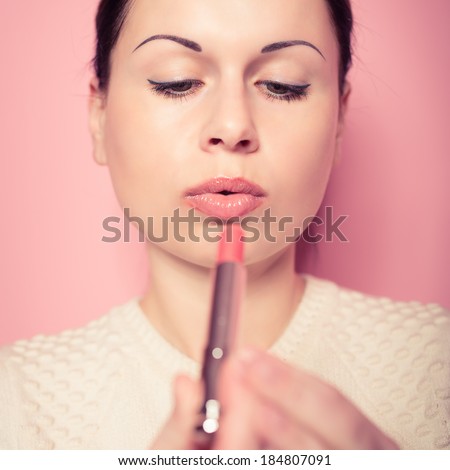 Part of attractive woman\'s face with fashion red lips make up