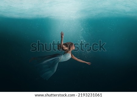 Similar – Image, Stock Photo mysterious woman under a black tulle