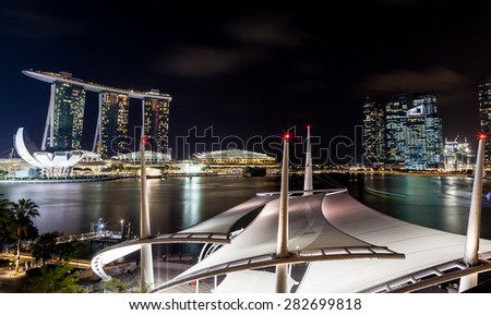 SINGAPORE - MARCH 26: Night scene of the unique Esplanade Outdoor Theater rooftop along Marina Bay with the Singapore skyline in the background March 26, 2015.