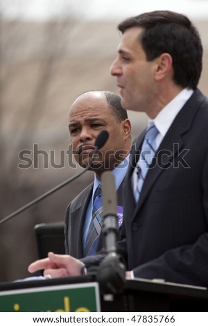 LOUISVILLE - MARCH 2: Maurice Sweeney, a US Senate candidate, listens to Lt. Governor Mongiardo addressing a crowd during a protest of loss of unemployment benefits on March 2, 2010 in Louisville, KY.