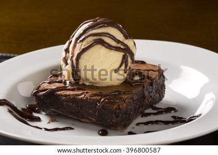 Similar – Image, Stock Photo Chocolate sauce on brownie cake