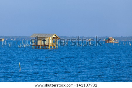 house in deep blue sea of gulf of thailand