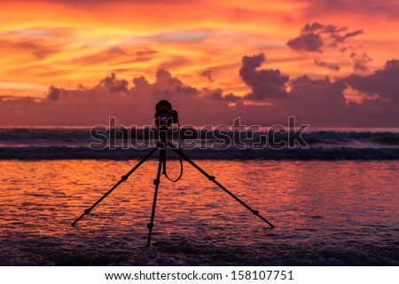 silhouette camera and sunset at Yai Bay beach, Payam island, Thailand