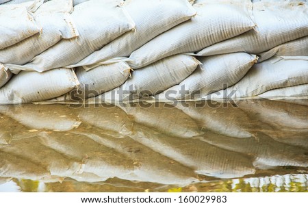 water barrier of sand bag to prevent flood in thailand