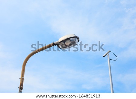 CCTV camera and street lamp