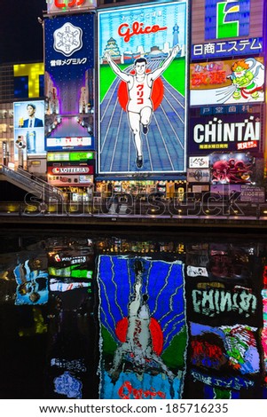 OSAKA, JAPAN - MARCH 23: The Glico Man light billboard and other light displays on March 23, 2014 in Dontonbori, Namba Osaka area, Osaka, Japan. Namba is well known as an entertainment area in Osaka.