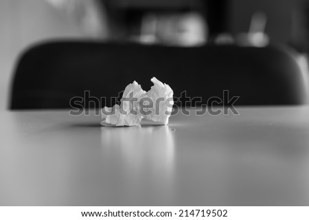 Concept used tissue paper on table. Black and white image. Focus to tissue paper.