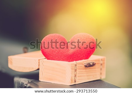 Valentine day background. heart in treasure chest box. Vintage filter.