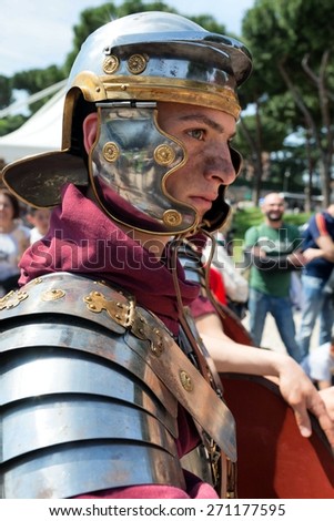 ROME, ITALY - APRIL 19, 2015: Birth of Rome festival - Actors dressed as ancient Roman Praetorian soldiers attend a parade to commemorate the 2,768th anniversary of the founding of Rome.