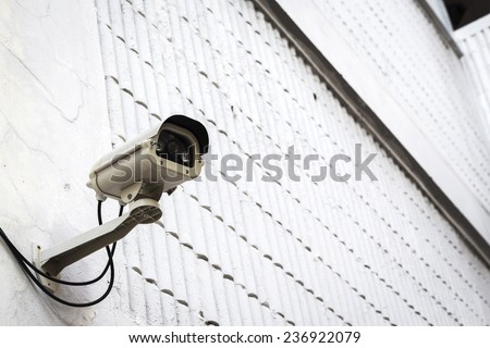cctv camera for security at exterior of white building