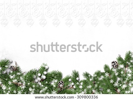 Winter tree border with decorations isolated on white background