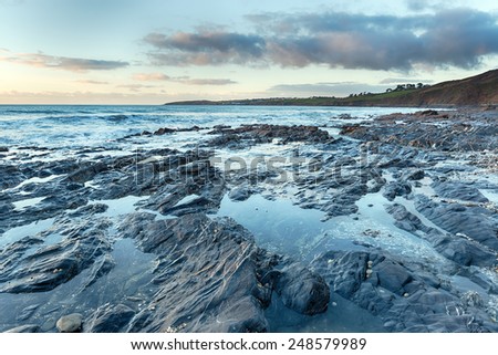 Rock pools at low tide on Pendower Beach in Cornwall Stock foto © 