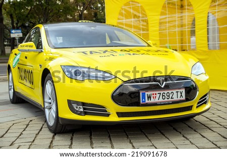 Vienna, Austria Sep 22, 2014 : Tesla Model S electronic car being publicly presented as a first e-taxi in Vienna in front of the Austrian Parliament on Sep 22, 2014 in Vienna.