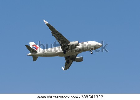 SHANGHAI, CHINA, April 2,  2015: China Eastern Airlines  A319 flying in the sky.