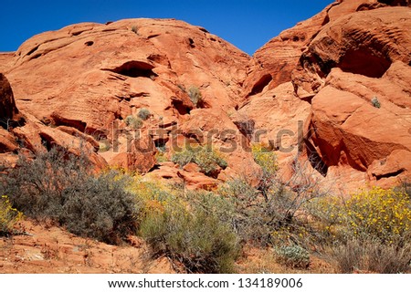 Red rock landscape with a blue sky.