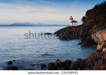 Lime Kiln Lighthouse. Situated in the northwest corner of Washington State, the San Juan Islands are breathtaking gems on a gentle sea that attract numerous visitors and adventurers each summer.