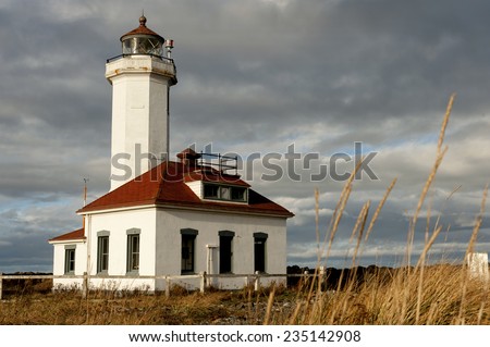 Point Wilson Lighthouse. Built in 1913 by the United States Lighthouse Service. At a height of 51 feet, the beacon is the tallest on Puget Sound, marking the entrance to Admiralty Inlet, Washington.