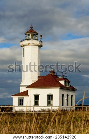 Point Wilson Lighthouse. Built in 1913 by the United States Lighthouse Service. At a height of 51 feet, the beacon is the tallest on Puget Sound, marking the entrance to Admiralty Inlet, Washington.