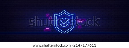 Neon light glow effect. Approved shield line icon. Accepted or confirmed sign. Protection symbol. 3d line neon glow icon. Brick wall banner. Approved shield outline. Vector