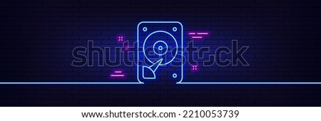 Neon light glow effect. HDD icon. Hard disk storage sign. Hard drive memory symbol. 3d line neon glow icon. Brick wall banner. HDD outline. Vector