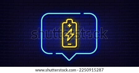 Neon light speech bubble. Battery charging line icon. Electricity energy type sign. Lightning bolt symbol. Neon light background. Battery charging glow line. Brick wall banner. Vector