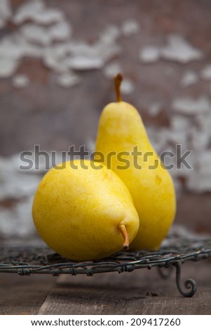 Two ripe yellow pears