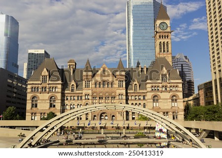TORONTO, CANADA - JULY 15, 2014:  Group of people on Nathan Phillips Square in Toronto in Canada.