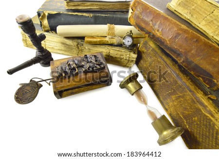 Adventure theme still life with books isolated