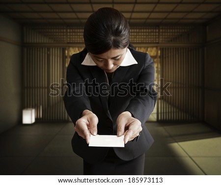 Businesswoman Giving Business Card