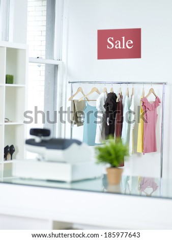 Sale Sign Above Clothes Rail