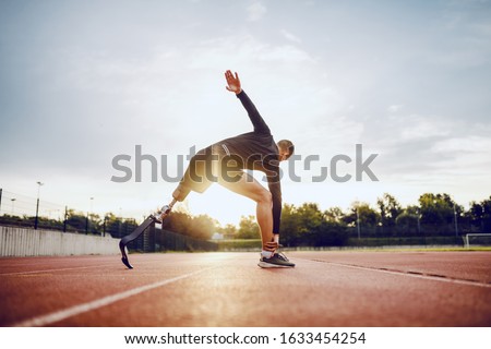 Similar – Image, Stock Photo Disabled man athlete stretching with leg prosthesis.