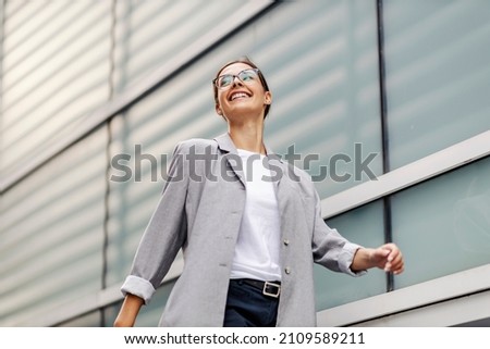 Similar – Image, Stock Photo Low angle view of rows of neoclassical balconies on the facade of a residential building