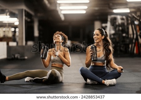 Image, Stock Photo Sportspeople drinking beverage during training in gymnasium